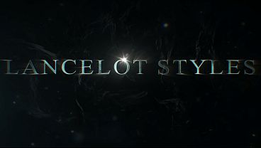 A lesbian duo preparing to insert a large cock into their asses