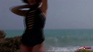 Curly fit body milf is having hard sex and squirts all over the sandy beach